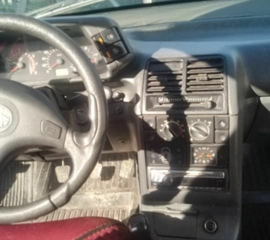 Сірий ВАЗ 2112, об'ємом двигуна 1 л та пробігом 100 тис. км за 971 $, фото 5 на Automoto.ua
