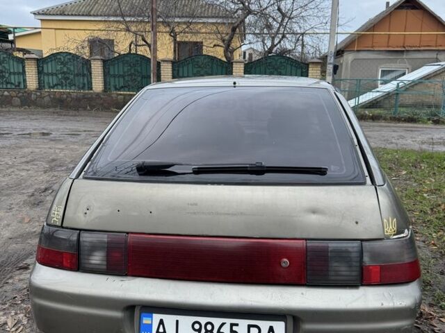 Серый ВАЗ 2112, объемом двигателя 1.5 л и пробегом 200 тыс. км за 950 $, фото 3 на Automoto.ua