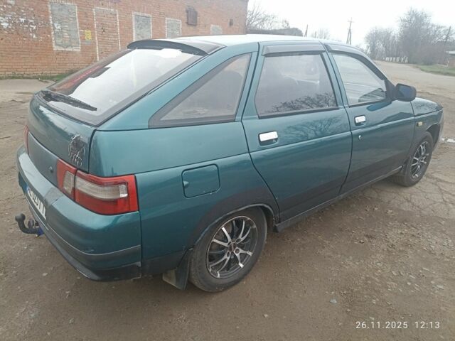 Зеленый ВАЗ 2112, объемом двигателя 1.5 л и пробегом 215 тыс. км за 1700 $, фото 4 на Automoto.ua