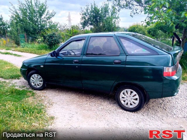Зеленый ВАЗ 2112, объемом двигателя 1.5 л и пробегом 280 тыс. км за 1850 $, фото 5 на Automoto.ua