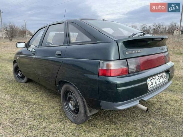 Зеленый ВАЗ 2112, объемом двигателя 1.5 л и пробегом 142 тыс. км за 1800 $, фото 3 на Automoto.ua