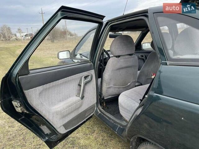 Зеленый ВАЗ 2112, объемом двигателя 1.5 л и пробегом 142 тыс. км за 1800 $, фото 13 на Automoto.ua