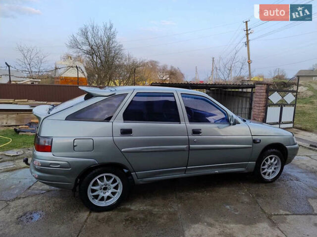 Зеленый ВАЗ 2112, объемом двигателя 1.5 л и пробегом 295 тыс. км за 1800 $, фото 4 на Automoto.ua