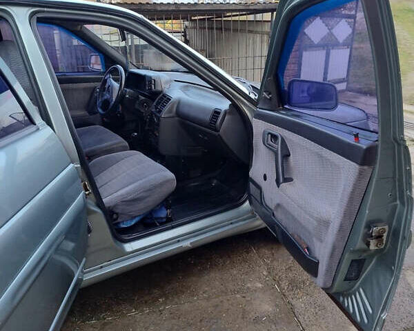 Зелений ВАЗ 2112, об'ємом двигуна 1.5 л та пробігом 295 тис. км за 2000 $, фото 7 на Automoto.ua