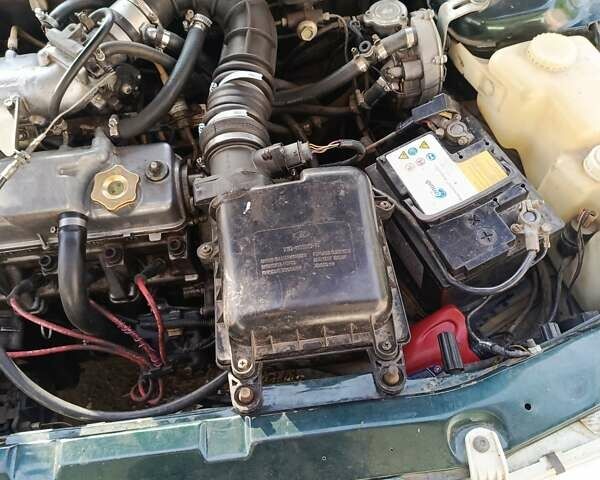 Зеленый ВАЗ 2112, объемом двигателя 1.5 л и пробегом 180 тыс. км за 1300 $, фото 1 на Automoto.ua