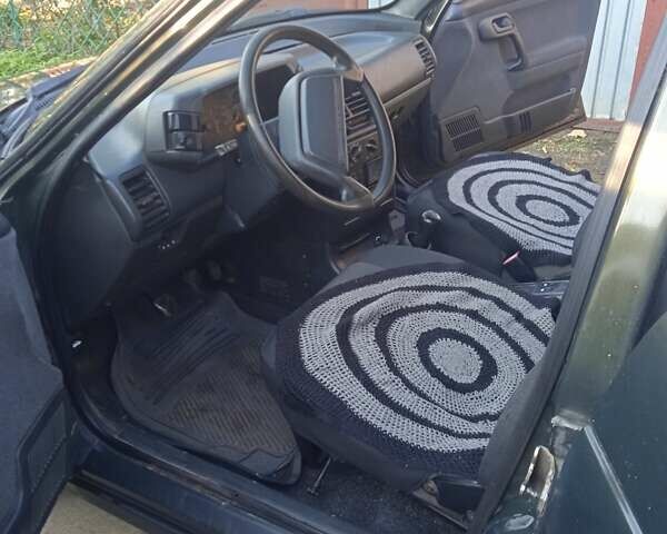 Зеленый ВАЗ 2112, объемом двигателя 1.5 л и пробегом 254 тыс. км за 1400 $, фото 4 на Automoto.ua