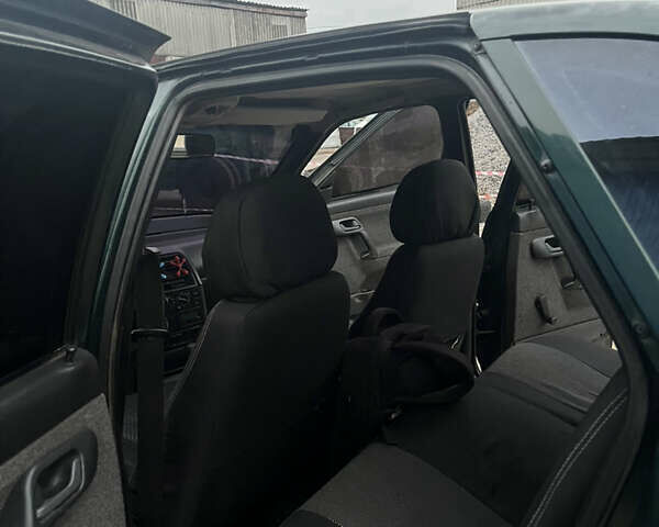 Зеленый ВАЗ 2112, объемом двигателя 1.6 л и пробегом 342 тыс. км за 1700 $, фото 4 на Automoto.ua