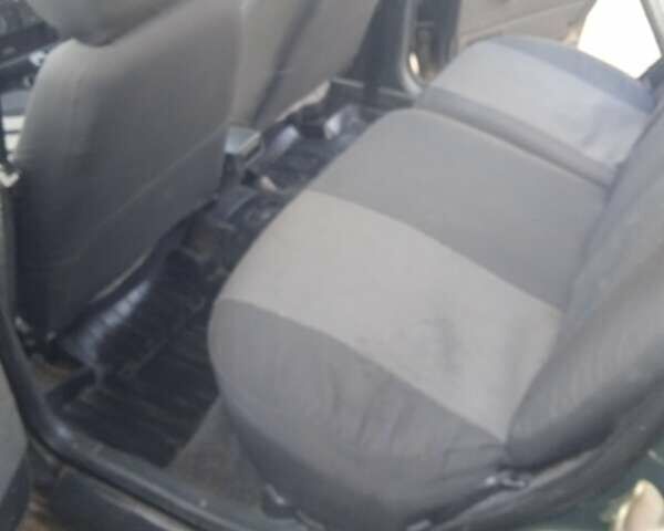 Зеленый ВАЗ 2112, объемом двигателя 1.5 л и пробегом 254 тыс. км за 1400 $, фото 17 на Automoto.ua