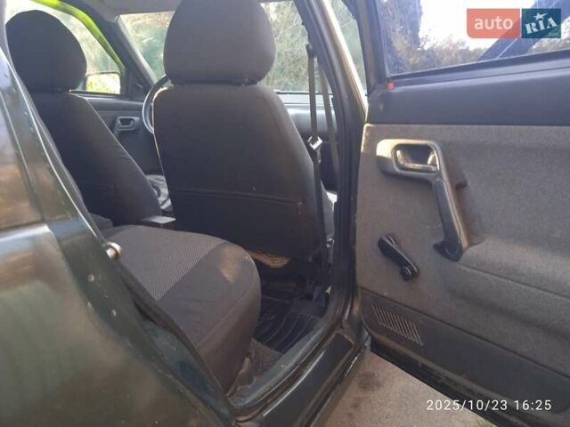 Зеленый ВАЗ 2112, объемом двигателя 1.5 л и пробегом 254 тыс. км за 1400 $, фото 7 на Automoto.ua