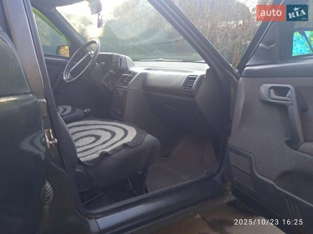 Зеленый ВАЗ 2112, объемом двигателя 1.5 л и пробегом 254 тыс. км за 1400 $, фото 6 на Automoto.ua