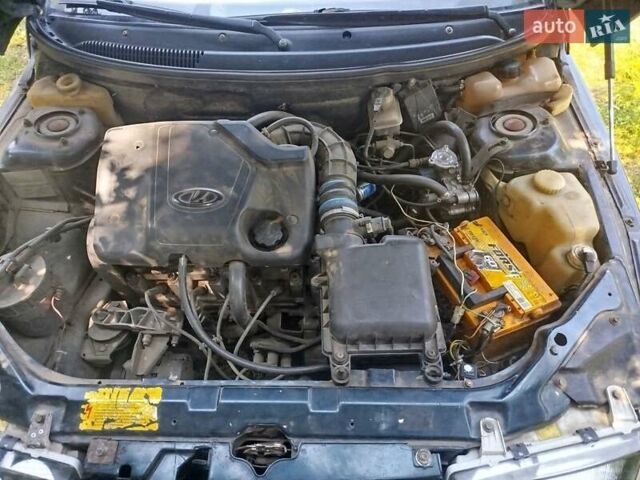 Зелений ВАЗ 2112, об'ємом двигуна 1.6 л та пробігом 228 тис. км за 1900 $, фото 6 на Automoto.ua
