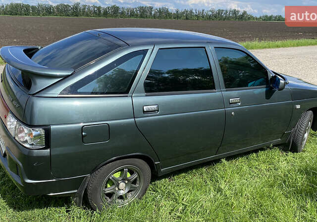 Зеленый ВАЗ 2112, объемом двигателя 1.6 л и пробегом 99 тыс. км за 4200 $, фото 67 на Automoto.ua