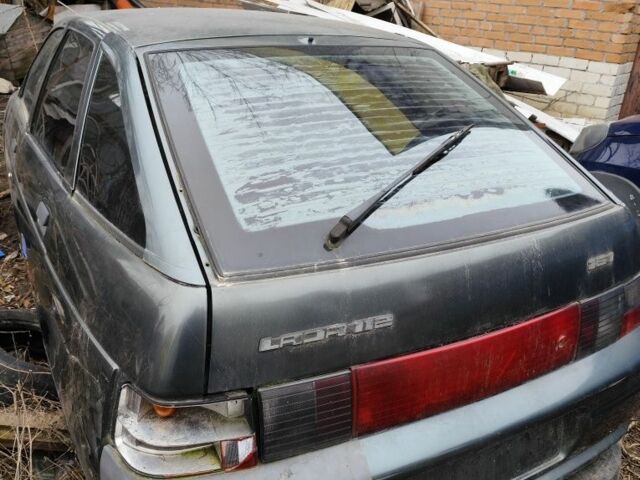 Зеленый ВАЗ 2112, объемом двигателя 1.5 л и пробегом 120 тыс. км за 473 $, фото 3 на Automoto.ua