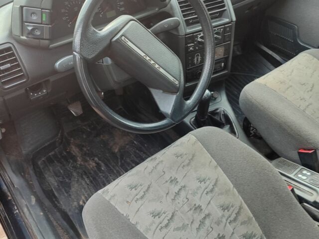 Черный ВАЗ 21124, объемом двигателя 1.6 л и пробегом 210 тыс. км за 750 $, фото 6 на Automoto.ua