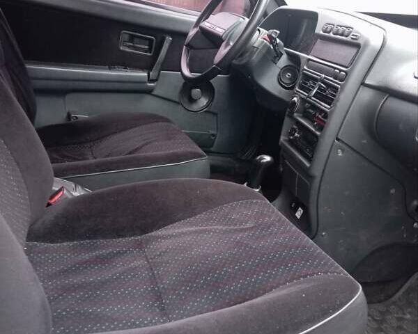 Черный ВАЗ 2113 Самара, объемом двигателя 1.6 л и пробегом 207 тыс. км за 1400 $, фото 7 на Automoto.ua