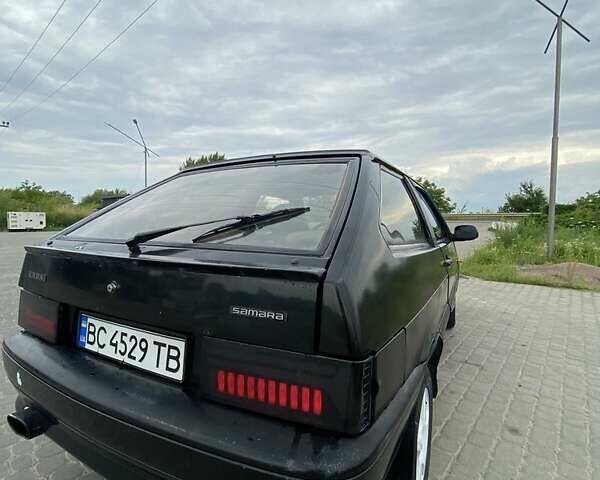 Черный ВАЗ 2113 Самара, объемом двигателя 1.6 л и пробегом 161 тыс. км за 1199 $, фото 3 на Automoto.ua