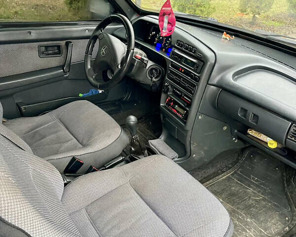 Черный ВАЗ 2113 Самара, объемом двигателя 1.6 л и пробегом 220 тыс. км за 1600 $, фото 8 на Automoto.ua