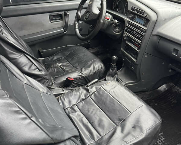 Черный ВАЗ 2113 Самара, объемом двигателя 1.6 л и пробегом 50 тыс. км за 1950 $, фото 10 на Automoto.ua