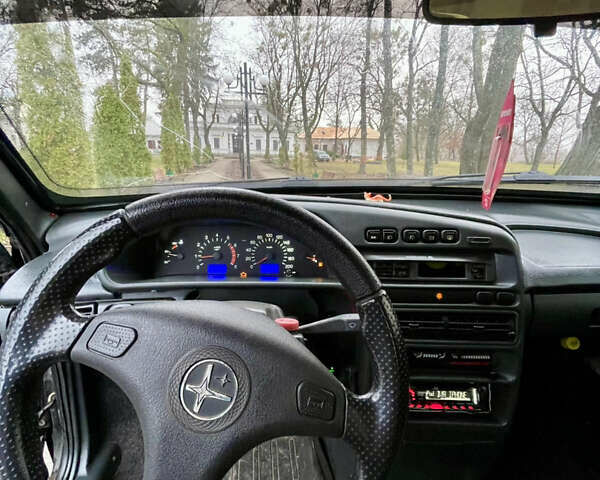 Черный ВАЗ 2113 Самара, объемом двигателя 1.6 л и пробегом 220 тыс. км за 1600 $, фото 5 на Automoto.ua