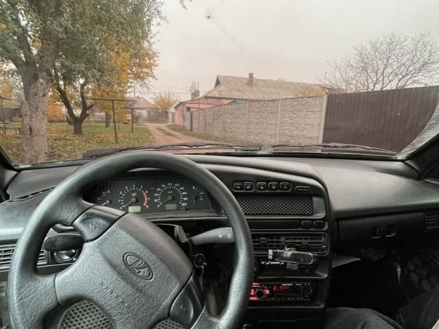 Серый ВАЗ 2113 Самара, объемом двигателя 1.6 л и пробегом 320 тыс. км за 1700 $, фото 5 на Automoto.ua