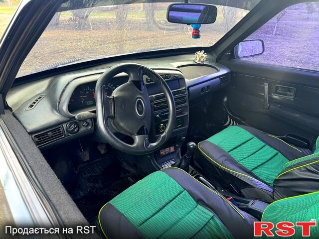 Зеленый ВАЗ 2113 Самара, объемом двигателя 1.5 л и пробегом 317 тыс. км за 1600 $, фото 8 на Automoto.ua