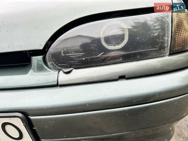 Зеленый ВАЗ 2113 Самара, объемом двигателя 1.6 л и пробегом 235 тыс. км за 2699 $, фото 3 на Automoto.ua