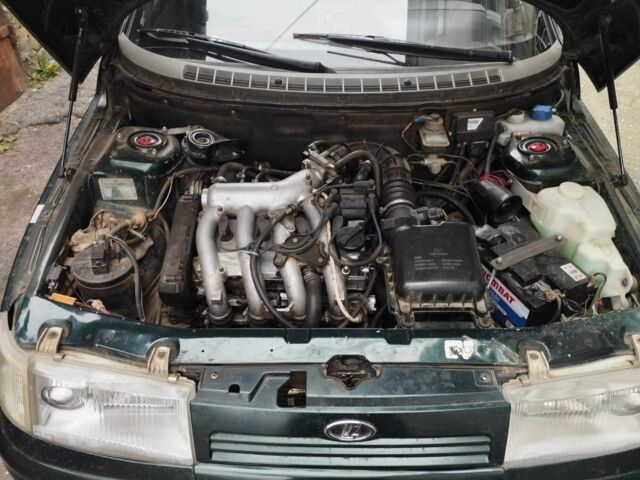 Зеленый ВАЗ 2113 Самара, объемом двигателя 1.5 л и пробегом 250 тыс. км за 2000 $, фото 5 на Automoto.ua