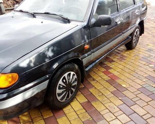 Черный ВАЗ 2114 Самара, объемом двигателя 1.5 л и пробегом 170 тыс. км за 1800 $, фото 1 на Automoto.ua