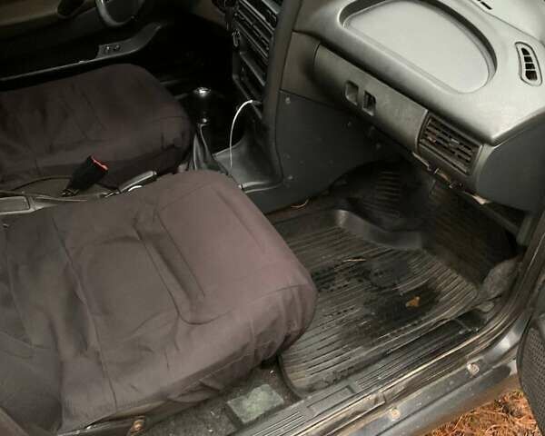 Черный ВАЗ 2114 Самара, объемом двигателя 1.6 л и пробегом 185 тыс. км за 2150 $, фото 12 на Automoto.ua