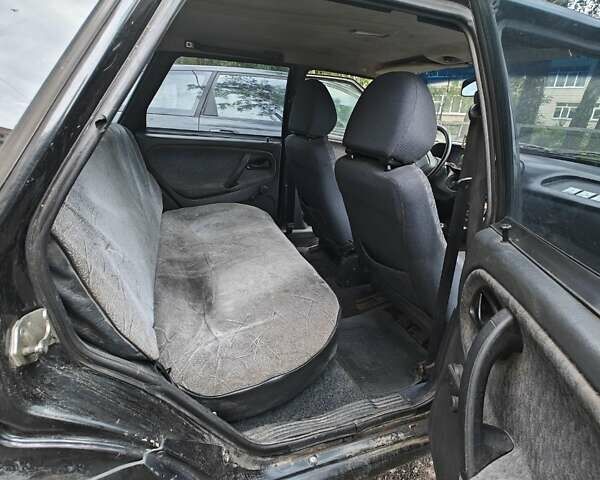 Чорний ВАЗ 2114 Самара, об'ємом двигуна 1.6 л та пробігом 320 тис. км за 1300 $, фото 6 на Automoto.ua