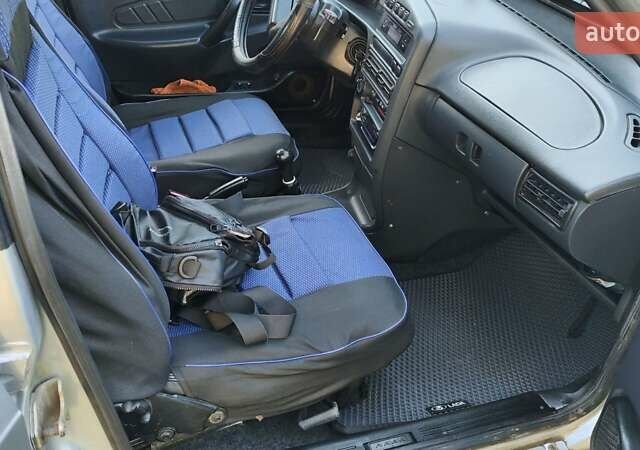 Серый ВАЗ 2114 Самара, объемом двигателя 1.5 л и пробегом 203 тыс. км за 1550 $, фото 5 на Automoto.ua