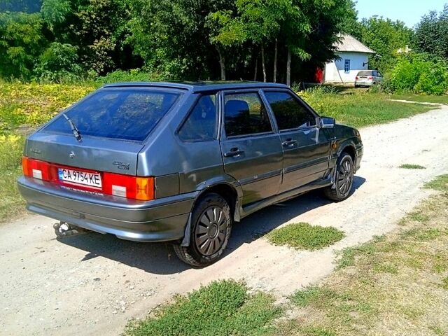 Серый ВАЗ 2114 Самара, объемом двигателя 1.5 л и пробегом 250 тыс. км за 1400 $, фото 2 на Automoto.ua