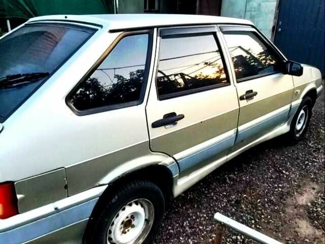 Серый ВАЗ 2114 Самара, объемом двигателя 1.5 л и пробегом 230 тыс. км за 1200 $, фото 1 на Automoto.ua