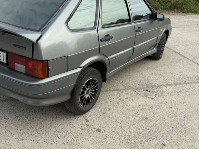 Серый ВАЗ 2114 Самара, объемом двигателя 1.5 л и пробегом 223 тыс. км за 900 $, фото 1 на Automoto.ua