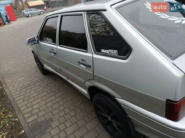 Серый ВАЗ 2114 Самара, объемом двигателя 1.6 л и пробегом 257 тыс. км за 2200 $, фото 2 на Automoto.ua