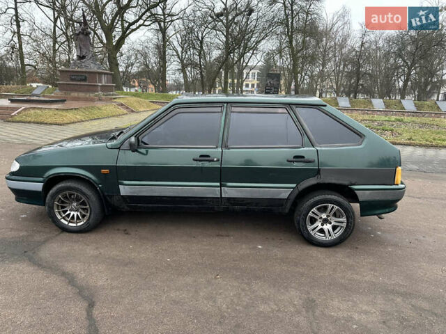 Зеленый ВАЗ 2114 Самара, объемом двигателя 1.5 л и пробегом 298 тыс. км за 1950 $, фото 4 на Automoto.ua