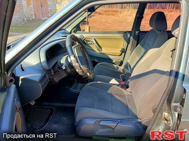 Зелений ВАЗ 2114 Самара, об'ємом двигуна 1.5 л та пробігом 182 тис. км за 2250 $, фото 4 на Automoto.ua