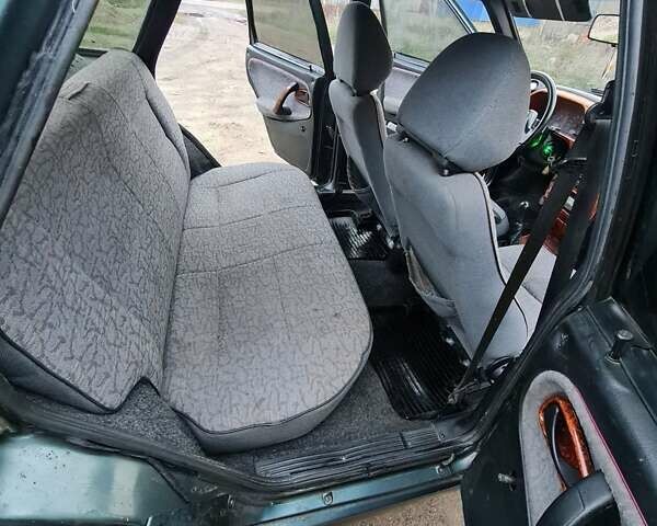 Зеленый ВАЗ 2114 Самара, объемом двигателя 1.6 л и пробегом 188 тыс. км за 1700 $, фото 8 на Automoto.ua