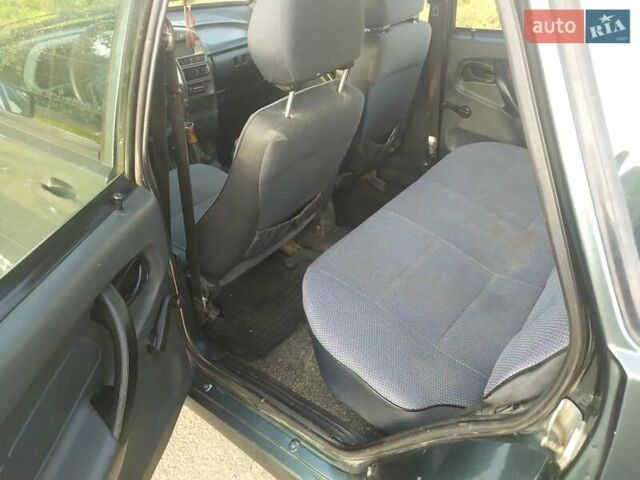 Зелений ВАЗ 2114 Самара, об'ємом двигуна 1.6 л та пробігом 230 тис. км за 1499 $, фото 10 на Automoto.ua