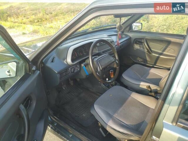 Зелений ВАЗ 2114 Самара, об'ємом двигуна 1.6 л та пробігом 230 тис. км за 1499 $, фото 11 на Automoto.ua