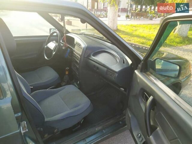 Зелений ВАЗ 2114 Самара, об'ємом двигуна 1.6 л та пробігом 230 тис. км за 1499 $, фото 8 на Automoto.ua