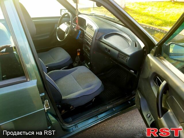 Зелений ВАЗ 2114 Самара, об'ємом двигуна 1.6 л та пробігом 230 тис. км за 1450 $, фото 5 на Automoto.ua