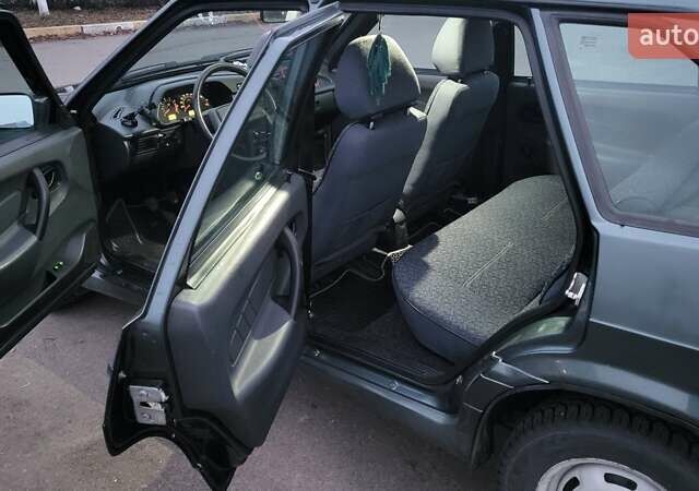 Зелений ВАЗ 2114 Самара, об'ємом двигуна 1.6 л та пробігом 75 тис. км за 2100 $, фото 13 на Automoto.ua