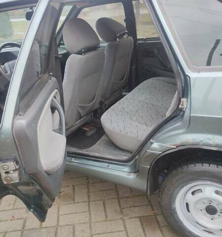 Зелений ВАЗ 2114 Самара, об'ємом двигуна 1.6 л та пробігом 165 тис. км за 1599 $, фото 12 на Automoto.ua