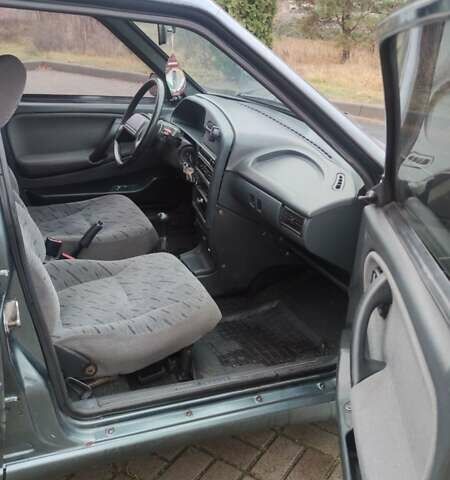 Зелений ВАЗ 2114 Самара, об'ємом двигуна 1.6 л та пробігом 165 тис. км за 1599 $, фото 15 на Automoto.ua