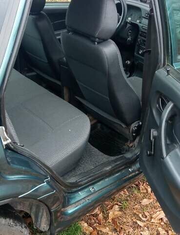 Зеленый ВАЗ 2114 Самара, объемом двигателя 1.6 л и пробегом 145 тыс. км за 2600 $, фото 7 на Automoto.ua