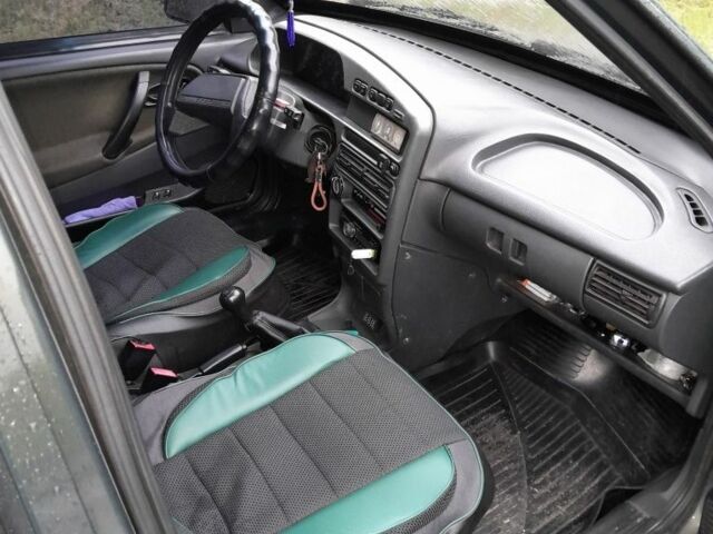 Зеленый ВАЗ 2114 Самара, объемом двигателя 1.5 л и пробегом 190 тыс. км за 2000 $, фото 9 на Automoto.ua