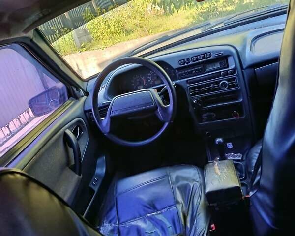 Черный ВАЗ 2115 Самара, объемом двигателя 1.6 л и пробегом 184 тыс. км за 2000 $, фото 1 на Automoto.ua