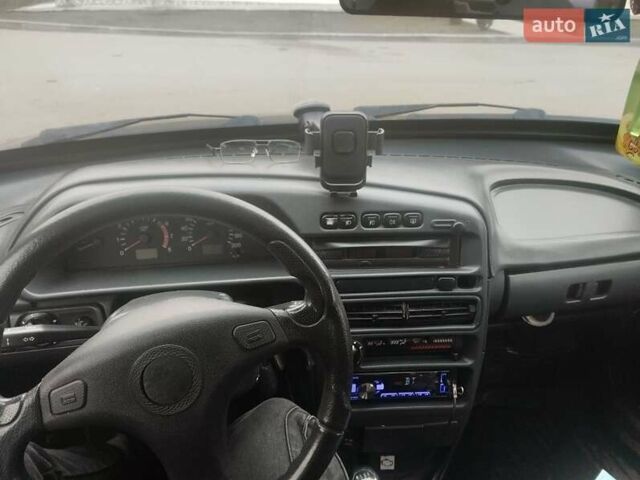 Красный ВАЗ 2115 Самара, объемом двигателя 1 л и пробегом 212 тыс. км за 1700 $, фото 13 на Automoto.ua