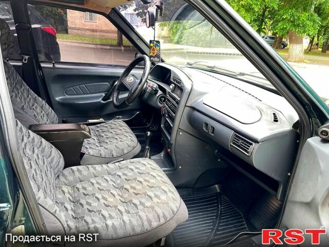 Зелений ВАЗ 2115 Самара, об'ємом двигуна 1.5 л та пробігом 234 тис. км за 2050 $, фото 7 на Automoto.ua